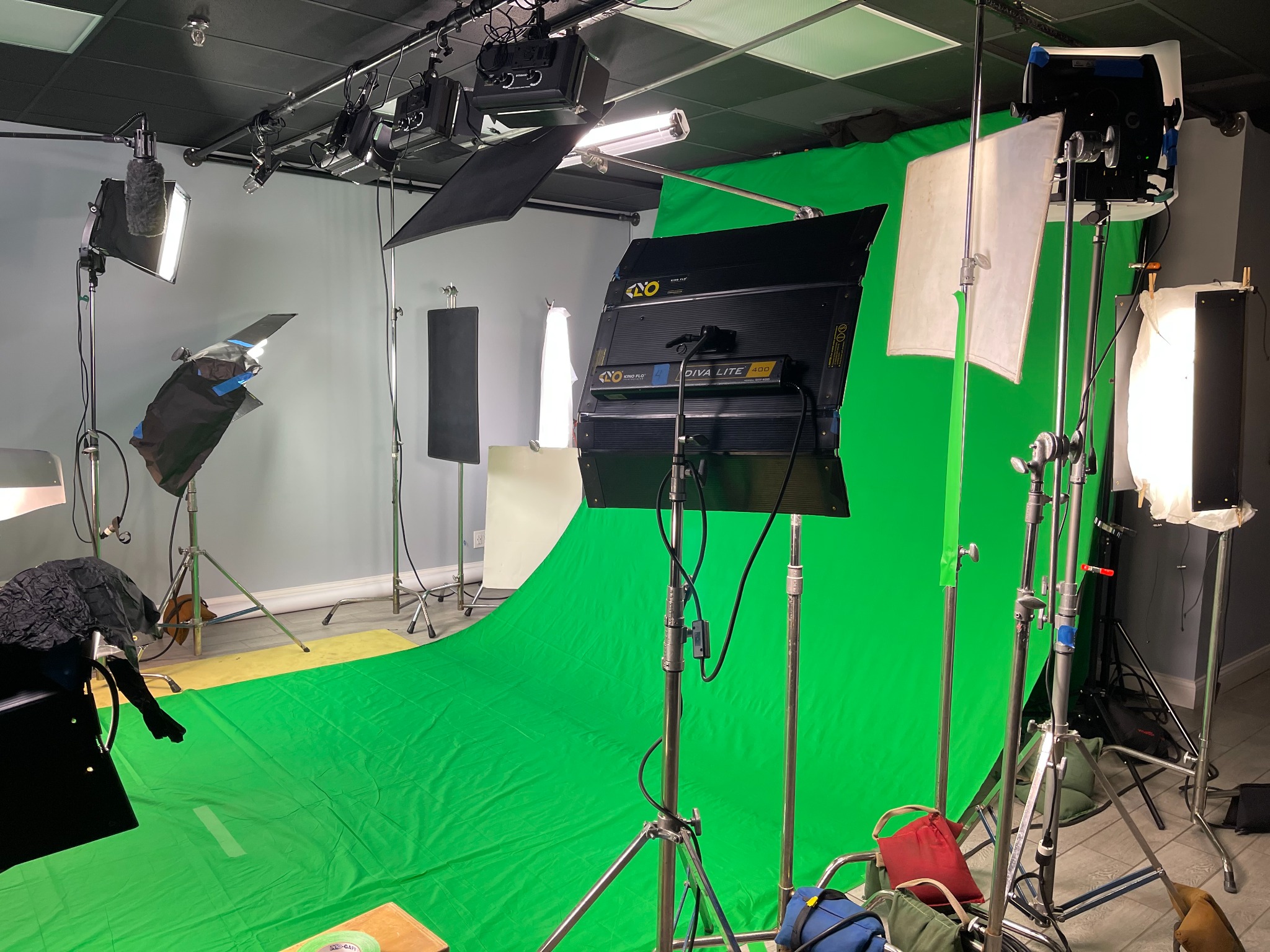 Magdalin green screen studio setup with lighting and grip gear